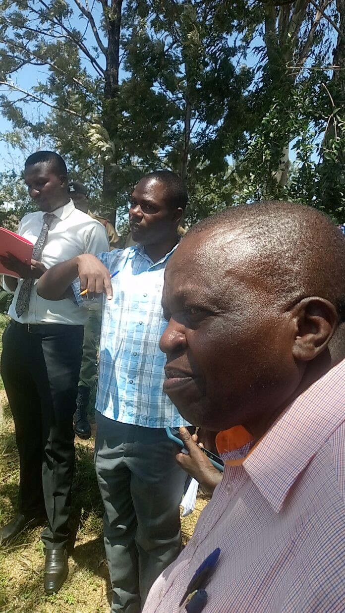 Contraversial Bungoma Lands Regestrar Felix Mwaura and team yet to release their reports in a plot to grab widows land